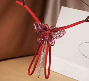 Stringi z motylkiem i perełkami 306