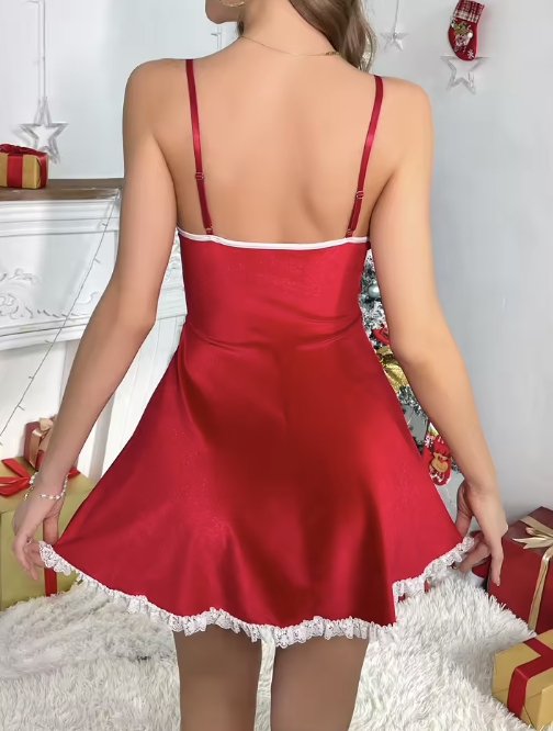 Czerwona świąteczna sukienka Santa Girl z satynowej tkaniny z białym wykończeniem i koronkową falbanką. Zmysłowa, elegancka i idealna na świąteczne wieczory. Idealna jako prezent.