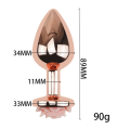 Złoty korek analny z różą dostępny w rozmiarach S, M i L. Elegancki metalowy plug analny z bezpieczną podstawą i dokładnymi wymiarami. Idealny dla początkujących i zaawansowanych.